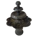 A beautifully crafted black marble fountain from Erfoud, Morocco, embedded with fossilized orthoceras, showcasing intricate fossil patterns and expert craftsmanship.
